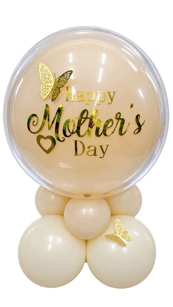 Clear bubble balloon with a blush balloon inside, printed Happy Mother’s Day in gold with butterflies